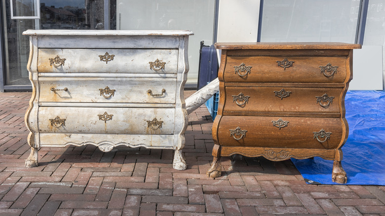 Old chests of drawers on a brick patio