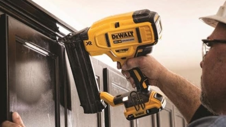 DeWalt 20V MAX XR 18 GA Cordless Brad Nailer being used on wall paneling