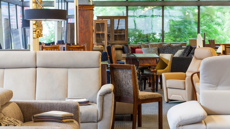 View of the furniture section at a thrift store.