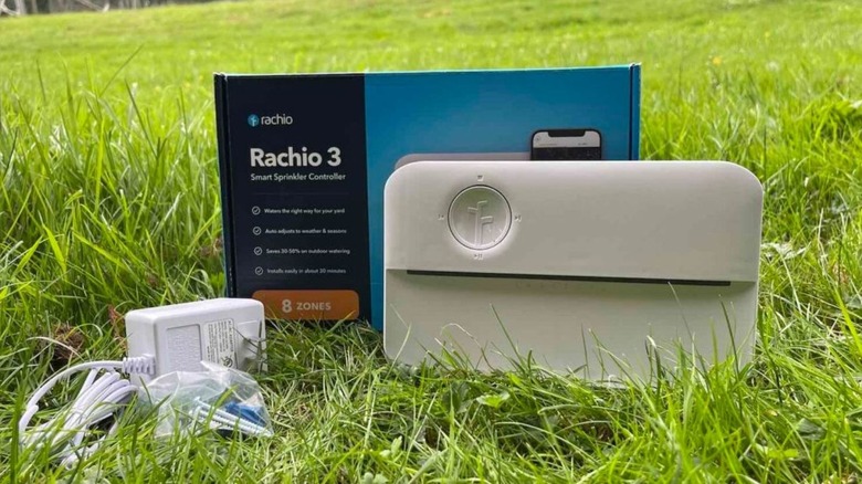 Rachio 3 kit sitting outside in the grass
