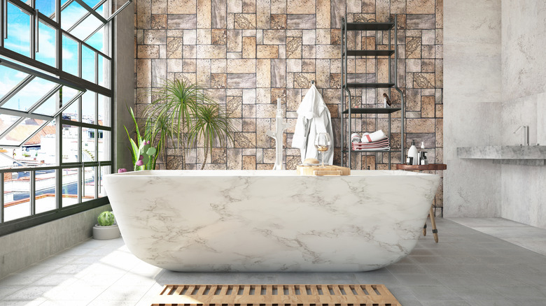 A luxurious marble freestanding tub.