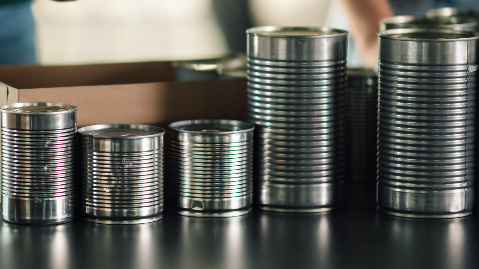 Use 3 Old Soup Cans To Create This Rustic Hanging Porch Décor