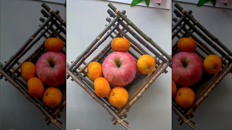 Fruit basket made out of twigs.