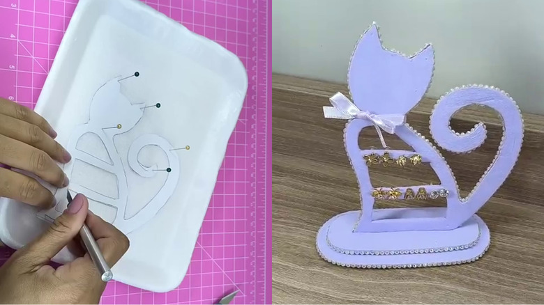 A styrofoam tray is transformed into a cat-shaped earring storage and display