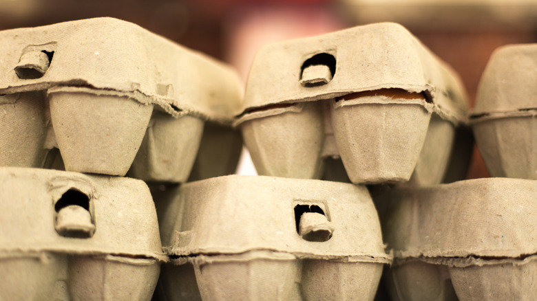 Egg cartons stacked.