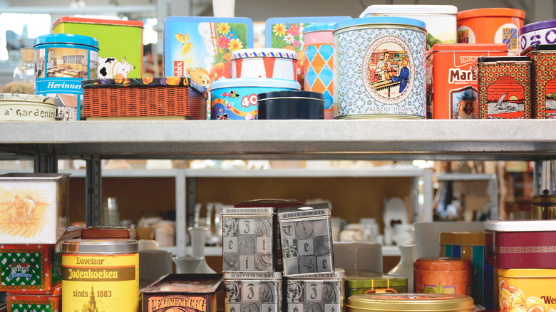 A variety of vintage tins on a store shelf