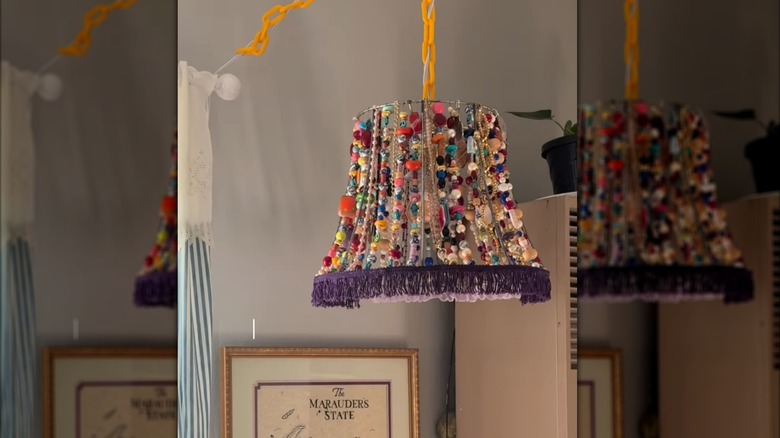 A close up of the beaded DIY lampshade with the light off