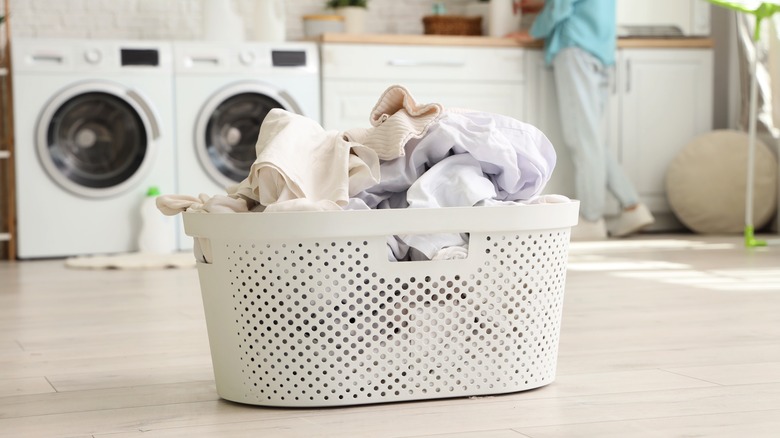 Laundry basket filled with clothes