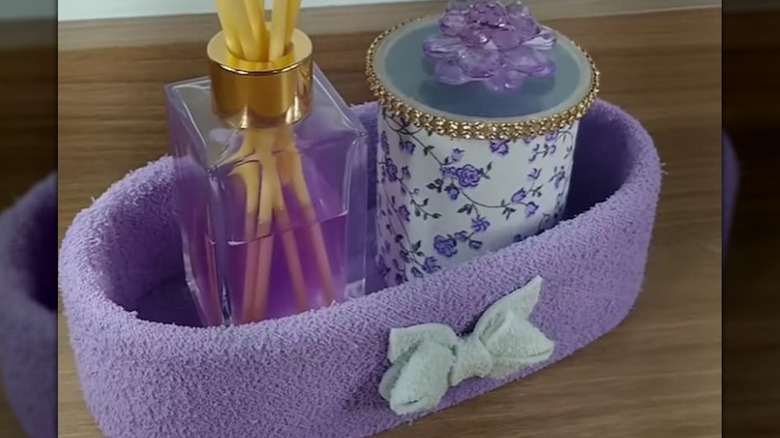 Purple felt bathroom storage container with bow