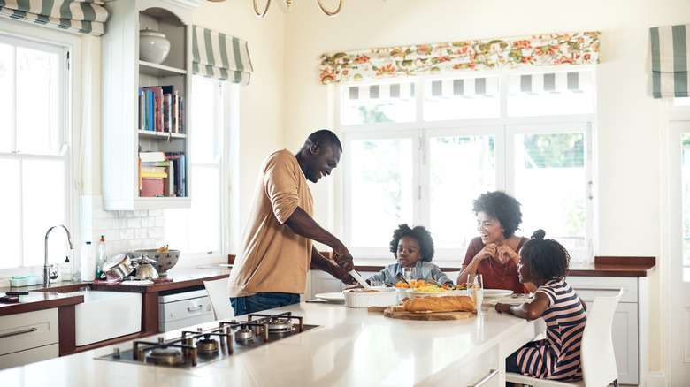 family eating in kitchen