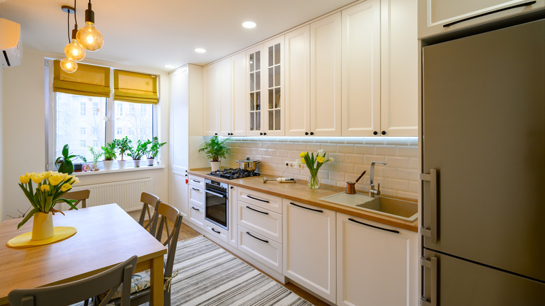 Modern white kitchen with natural light
