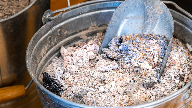 Close up of wood ash in bucket