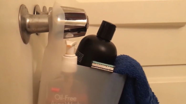 final look of DIY caddy, hanging from a shower valve handle