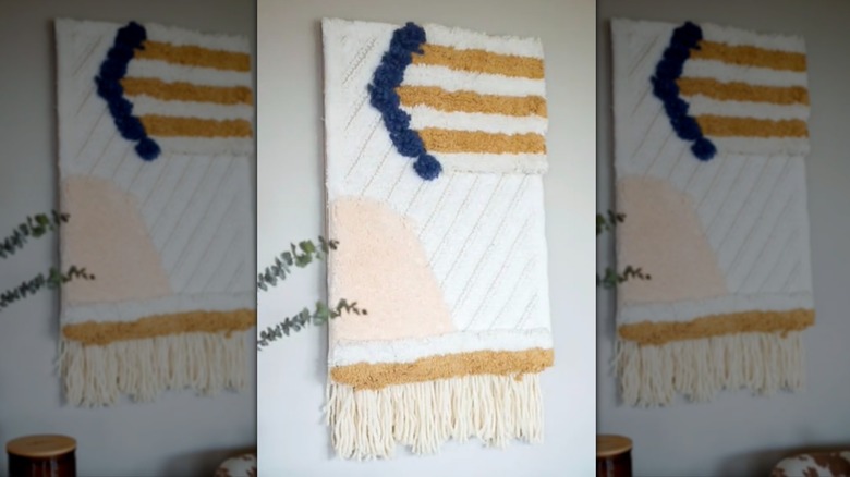 DIY wall art piece made with bath mats.