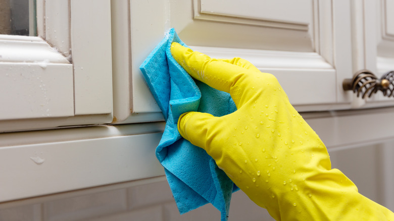 cleaning kitchen cabinets