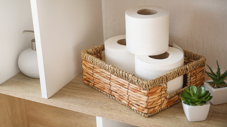 toilet paper rolls on shelf