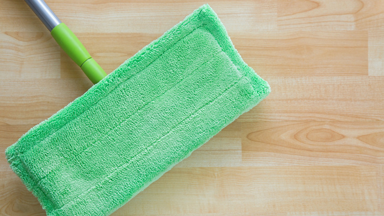Mopper with green cloth