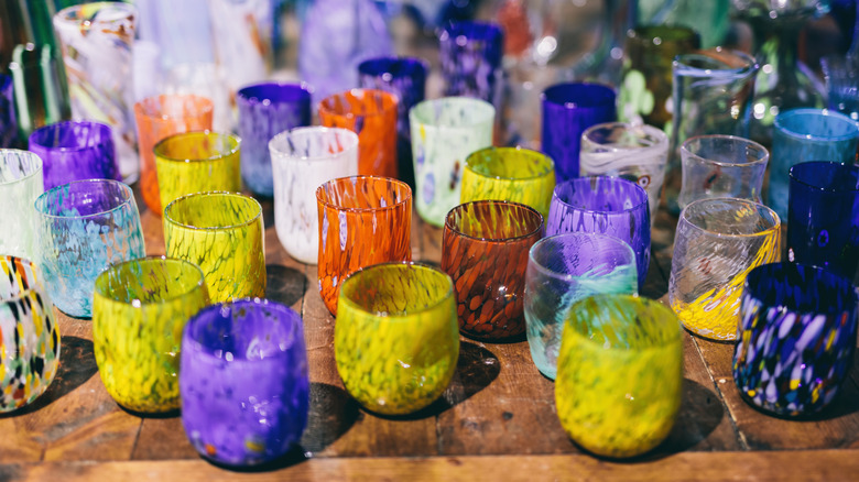 Murano glass exhibition of handmade glassware at workshop in Murano, Italy.
