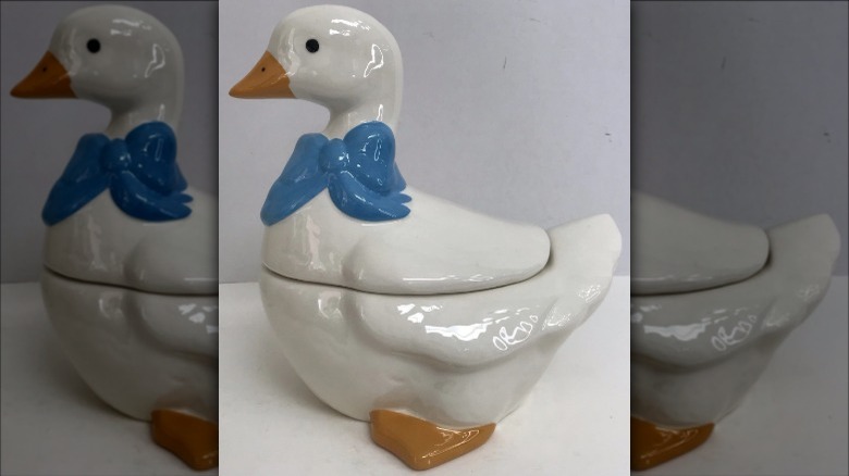 Mother goose cookie jar with blue ribbon