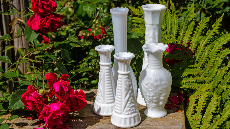 display of milk glass vases