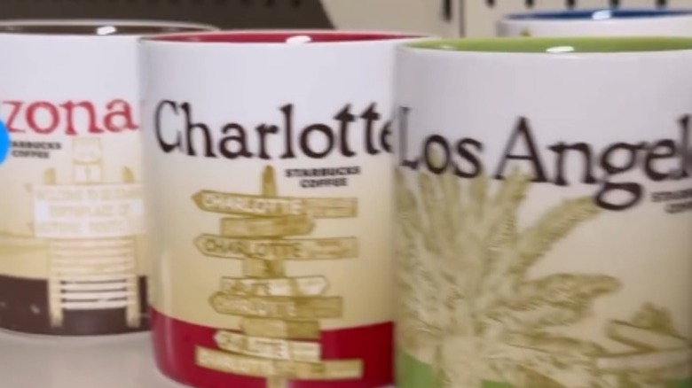 Row of Starbucks mugs