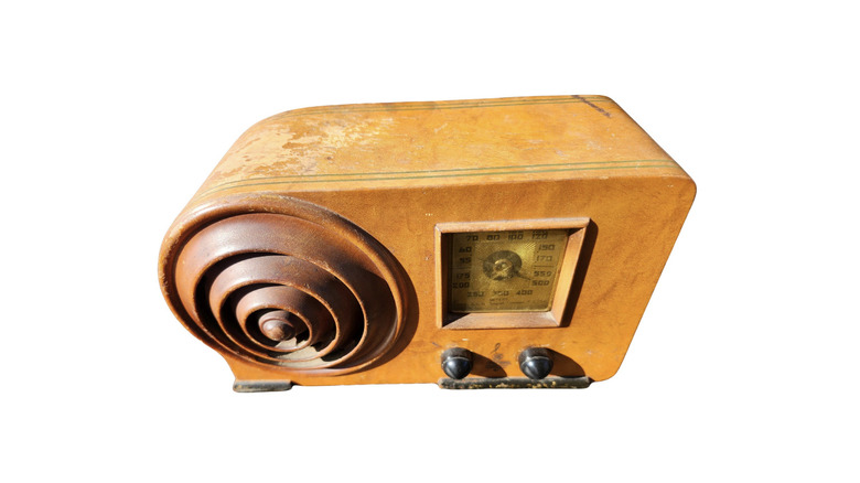 A vintage wooden art deco radio.