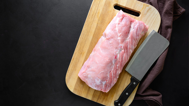 Raw meat on cutting board
