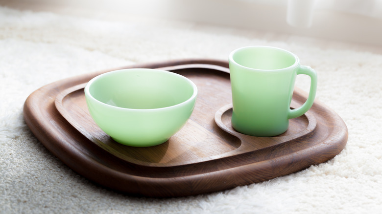 vintage Jade-ite mug and bowl on a wood tray