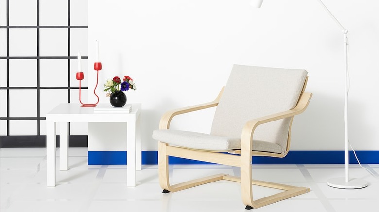 Bright white room with a chair and table