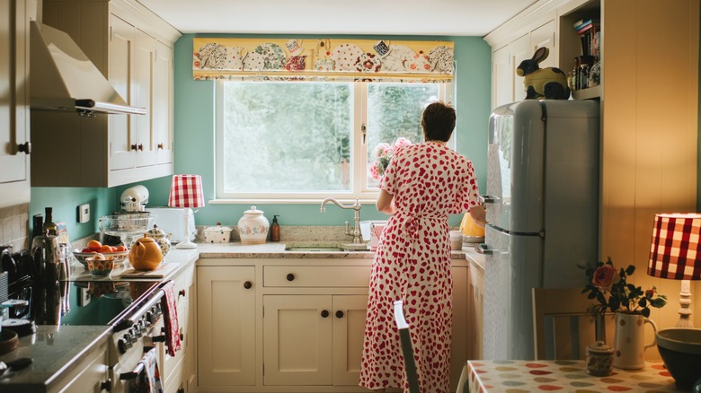 Woman in a retro-style kitchen