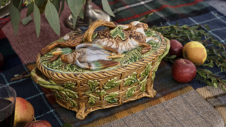 The Minton majolica game game pie dish on a plaid table cloth