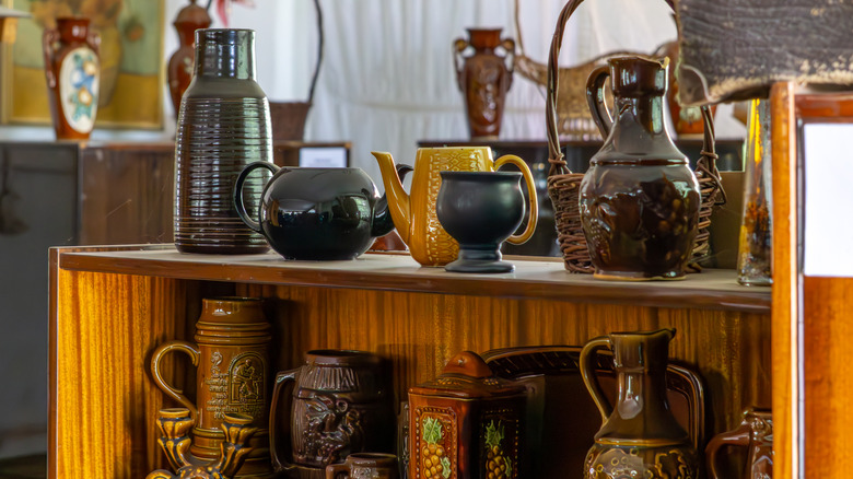 Vintage vases sitting on a shelf