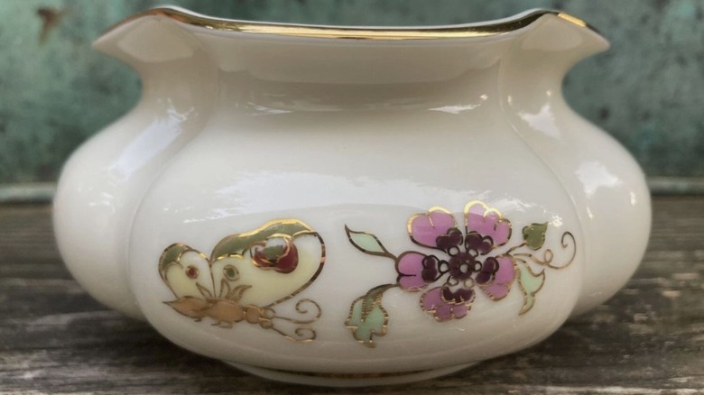 Small floral vase with gold trrim