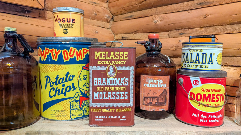 Vintage tin cans on a shelf