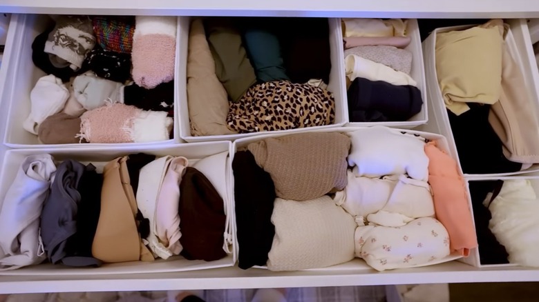 A clothing drawer organized using SKUBB organizer boxes.