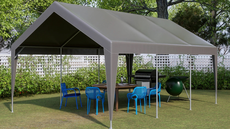 Walmart carport being used for BBQ.