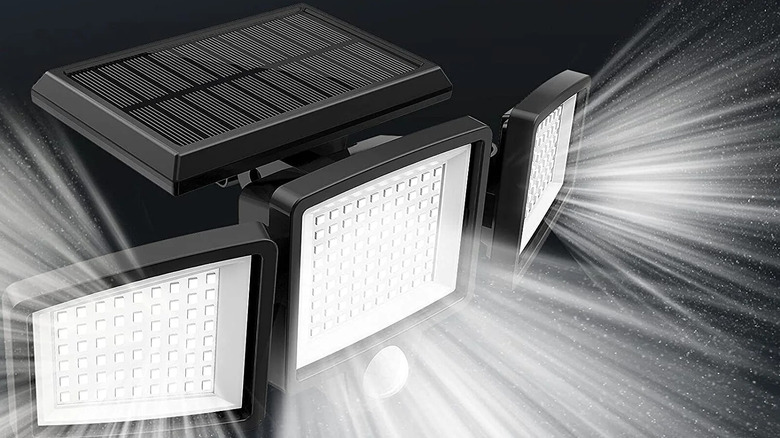 A SZRSTH Outdoor Security Solar Light is shown in detail