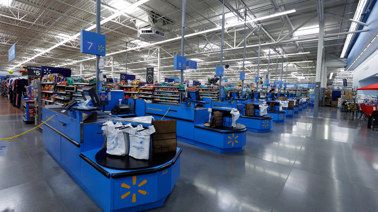Empty Walmart checkout lanes are ready for customers.