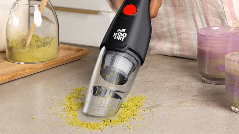 Dirt Devil vacuuming up matcha on the counter