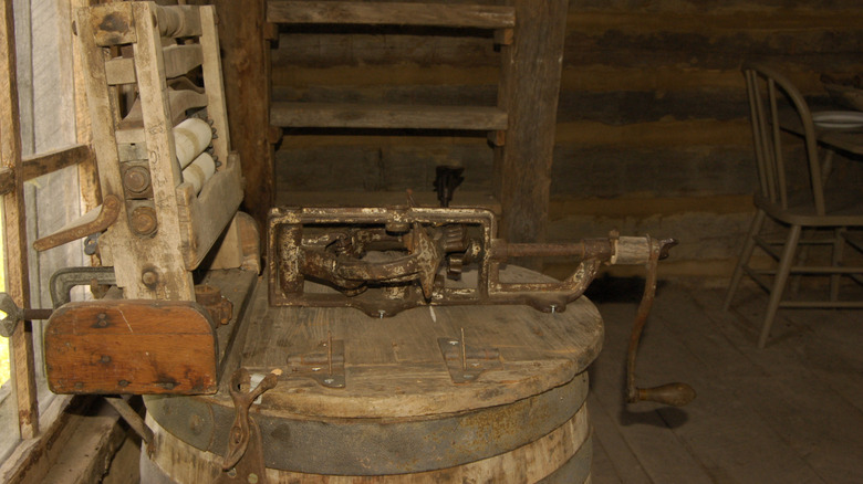 An old-fashioned hand-cranked washing machine