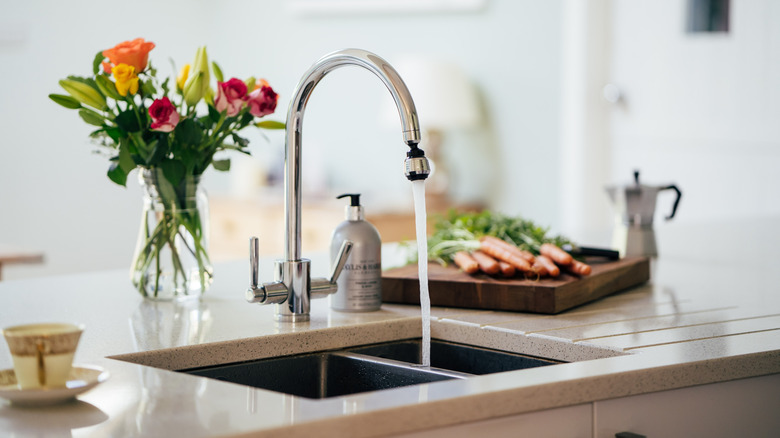 Kitchen sink with running water