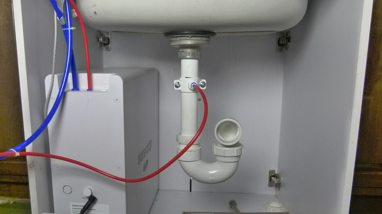 Padding the drain saddle for a small drain pipe