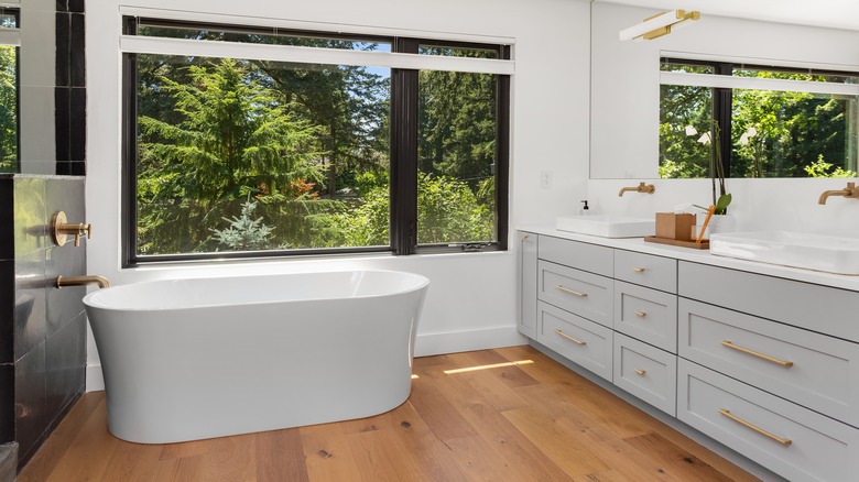 bathroom with hardwood floors