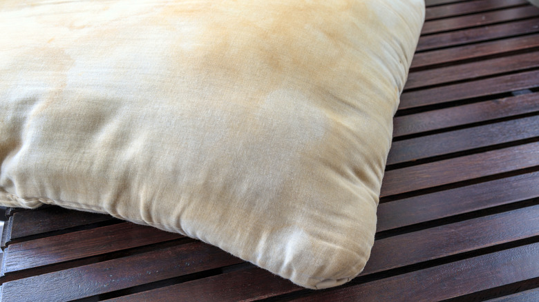 Dirty pillow with stains