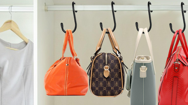 Closet with purse hung on purse hanger