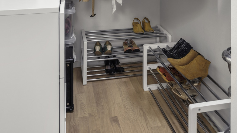 Zoomed in image of closet with freestanding dresser