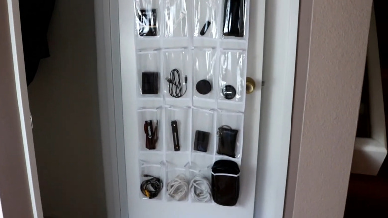 Various cords and electronic components organized in clear pouches