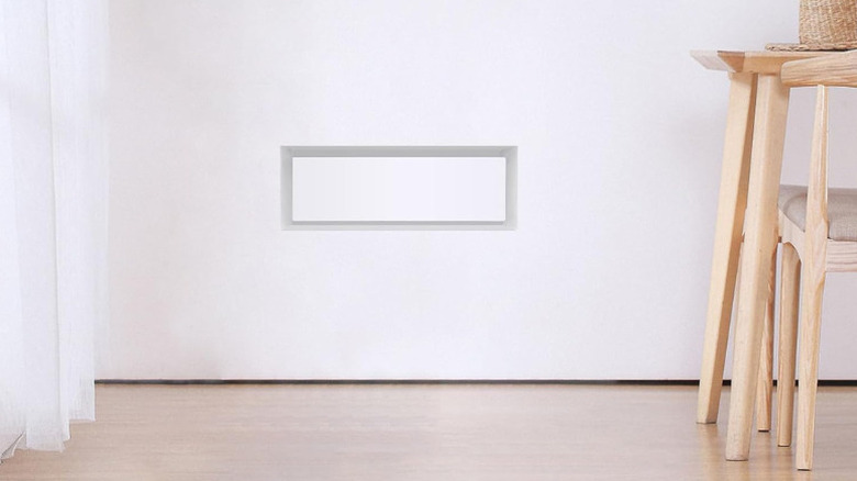 A flush-mounted vent integrated into a home wall
