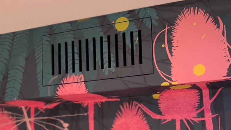 A vent disguised with wallpaper