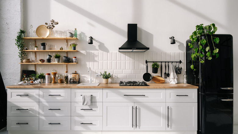 open wood shelving in kitchen